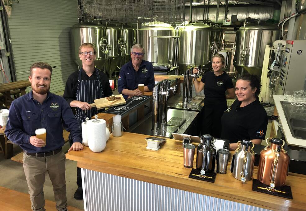 Sow and Piglets Brewery head brewer Julian Widera (left), brewery owner John Moloney and staff at the new brewery in Cooriemungle.