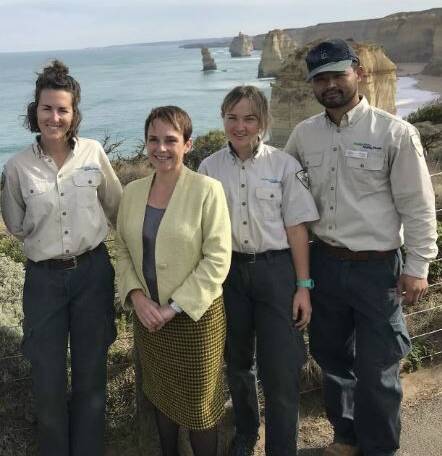 Regional Development Minister Jaala Pulford with Parks Victoria rangers Amelia Handscombe, Sarah Matthews and Wenbo Chen at the Twelve Apostles earlier this year.