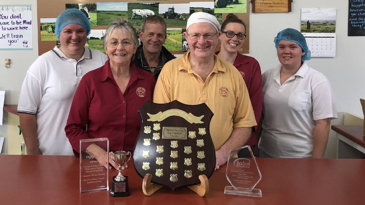Apostle Whey Cheese's Dianne and Julian Benson celebrate their award wins with staff.