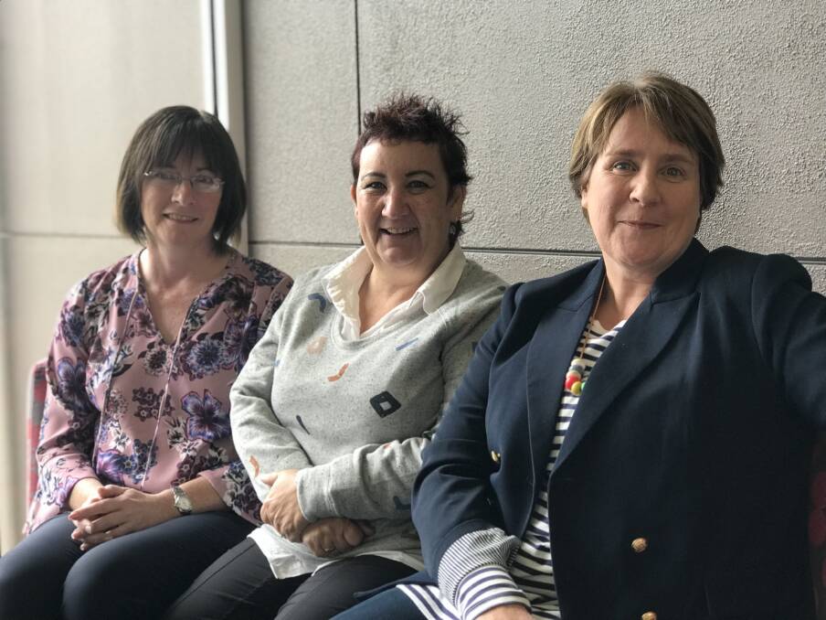 Honour: Mercy Regional College's Tania Bruckner (right) was awarded the Spirit of Life Award at the Ballarat Diocesan Catholic Education Week dinner. Fellow Mercy teachers Leanne Carpenter (left) and Lesa Thornton were given 30-year service awards.