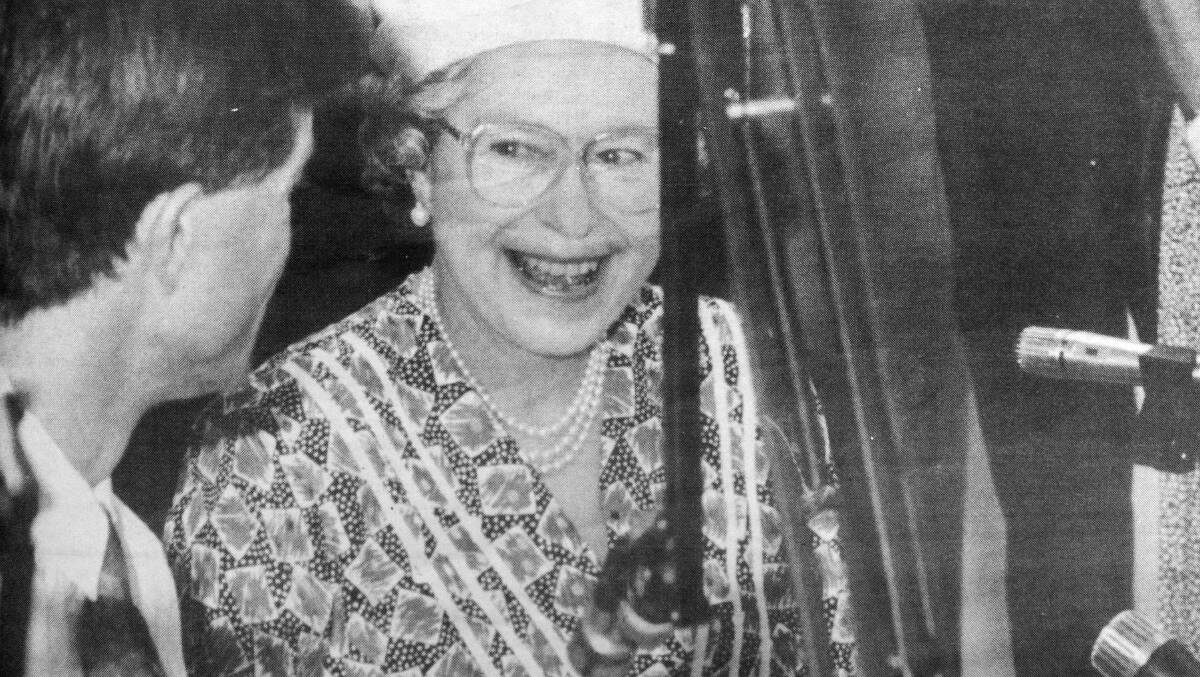The Queen shares a laugh with teacher John Carter at Dubbo's School of Distance Education.
