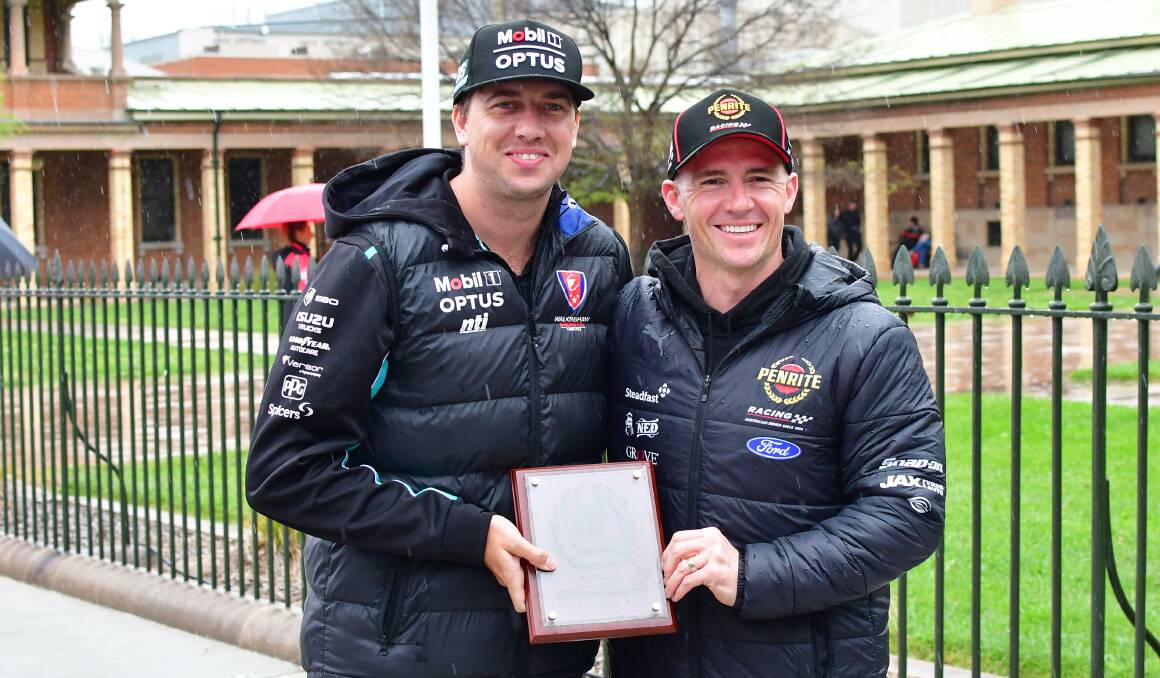 Last year's Bathurst 1000 winners Chaz Mostert and Lee Holdsworth with their winner's plaque.