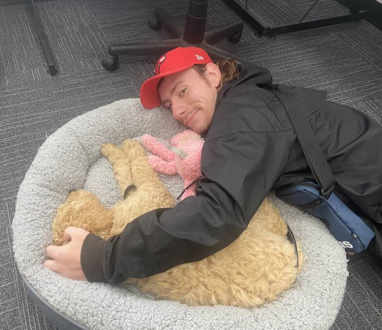 COMPANIONSHIP: Paul with Luna, 360 Southwests therapy dog. Photos: Supplied 
