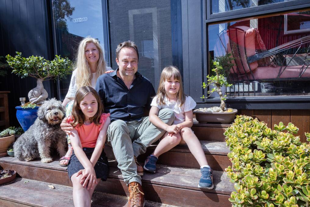 Kerrie Pearson and Richard Smith with their daughters Heidi and Asha, and dog Beardsley. Pictures by Sean McKenna