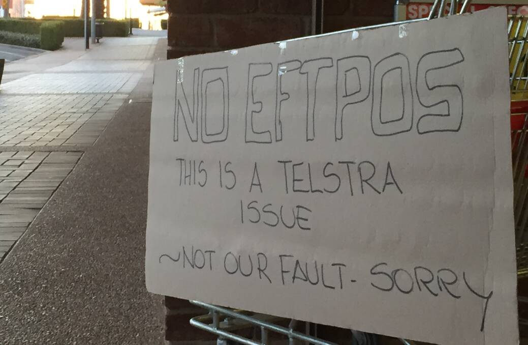 IGA store at Harden warned customers but tempers still flared with no EFTPOS system and ATMs knocked out by the Telstra breakdown.