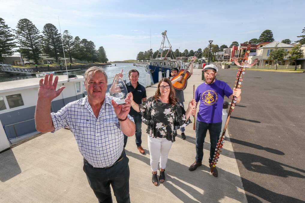 A great day: Mayor Mick Wolfe, Wotif managing director Daniel Finch, Roma Britnell, and Southern Ocean Sea Band members Gus Franklin and Jordan Lockett. Picture: Michael Chambers.