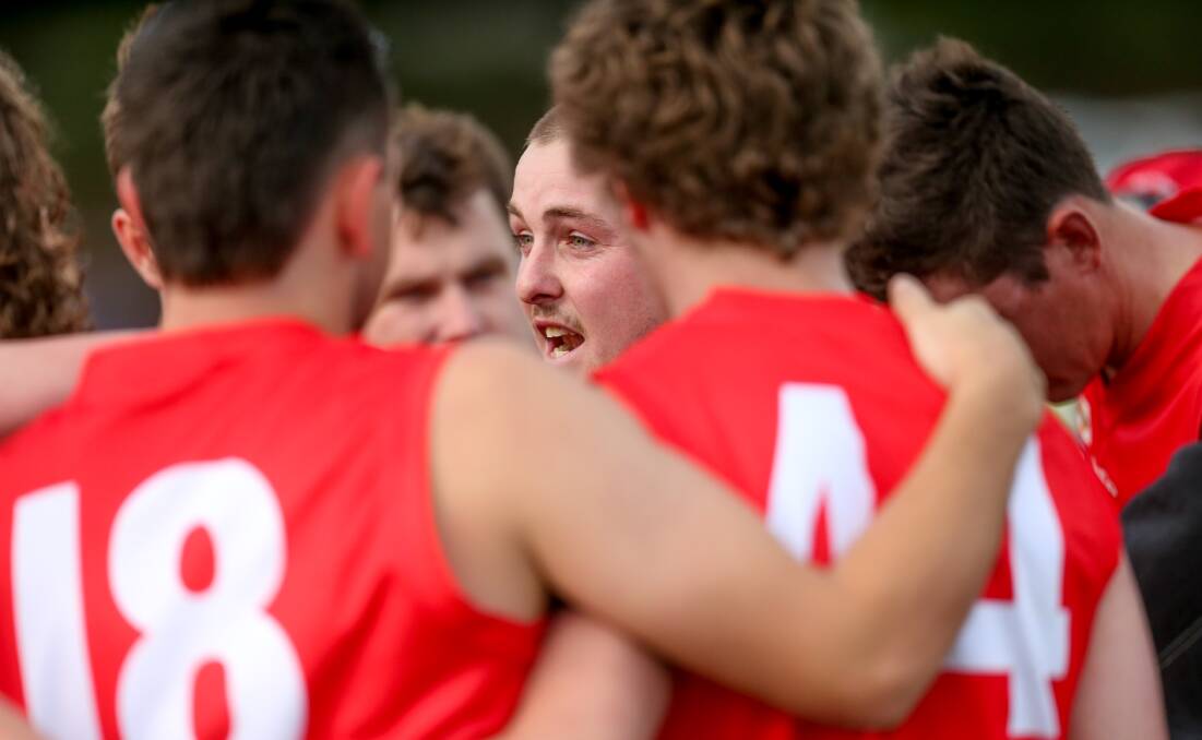 Taking positivies: Ben Thornton speaks to the team during a break against Panmure in round one. Picture: Chris Doheny 