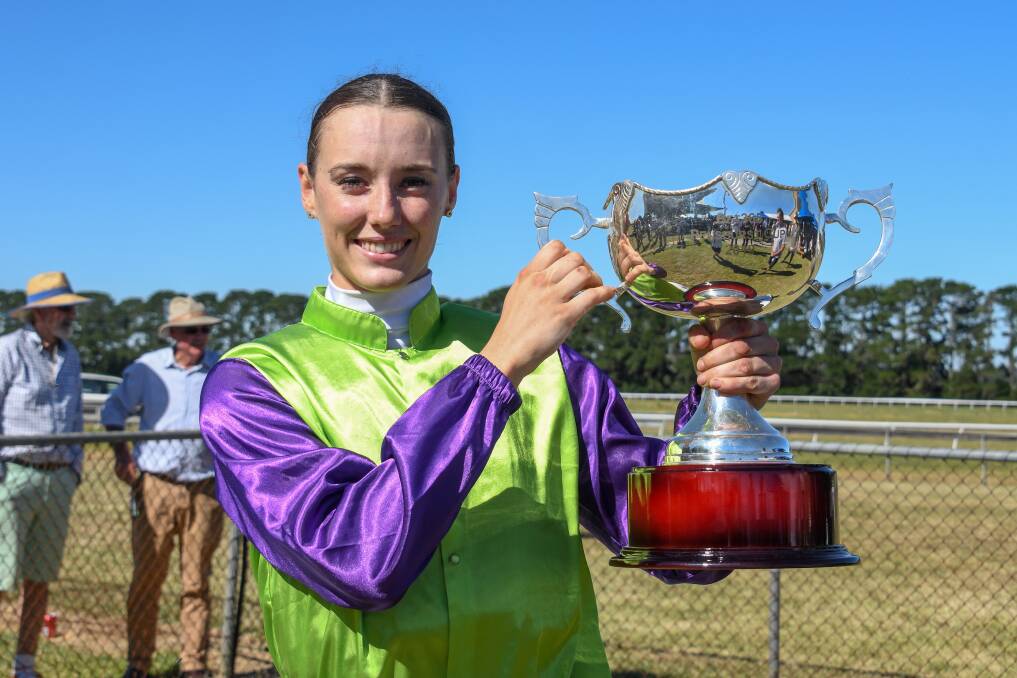 Trophy: Unrealistic jockey Laura Lafferty after winning the Penshurst Cup at Penshurst Racecourse on Boxing Day. Picture: Alice Laidlaw/Racing Photos