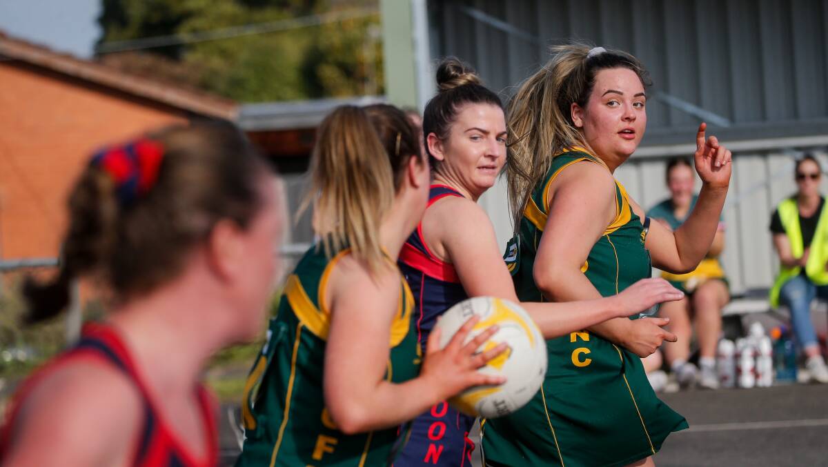 Teamwork: Old Collegians' Emily Jansen Van Beek calls for the ball against Timboon Demons on Saturday. Picture: Anthony Brady 