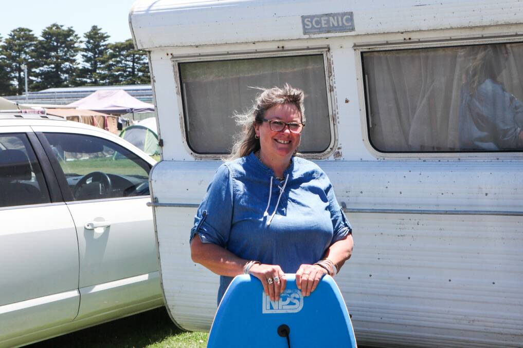 Ready for waves: Tanya Lloyd with her 40 year old caravan at Southcombe Caravan Park in Port Fairy.