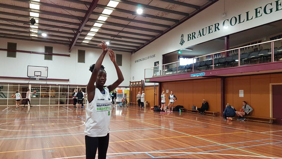 For the bucket: Mermaids guard Juina Lual shoots from the free-throw line at training this week. Picture: Brian Allen