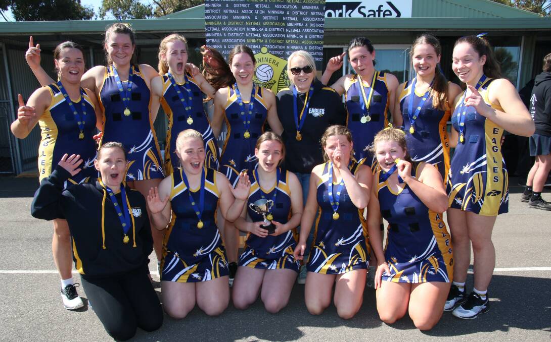Thrilled: Hawkesdale Macarthur's 15 and under netball team celebrates after its premiership win. Picture: Tracey Kruger. 