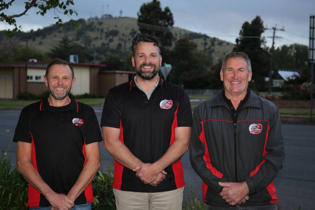 All smiles: Penshurst football director Chris Bensch, new senior football coach Cameron Penny and president Brendan Cottrill. Picture: Tracey Kruger