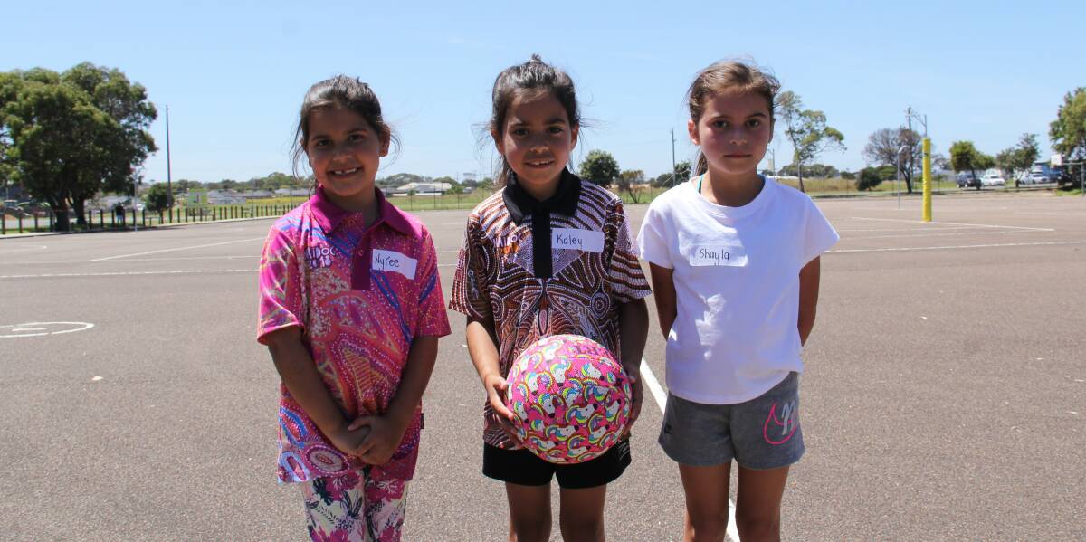 Having fun: Nyree Grayson, 6, Kaley Grayson, 8, and Shayla Chatfield, 8, enjoyed the Netball Victoria clinic on Thursday in Warrnambool. Picture: Brian Allen