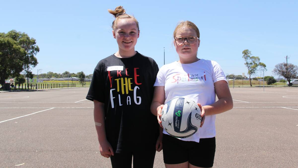 Returning to netball: Alexis Chatfield, 11, and Arlie Chatfield, 12, at the Netball Victoria clinic. Picture: Brian Allen