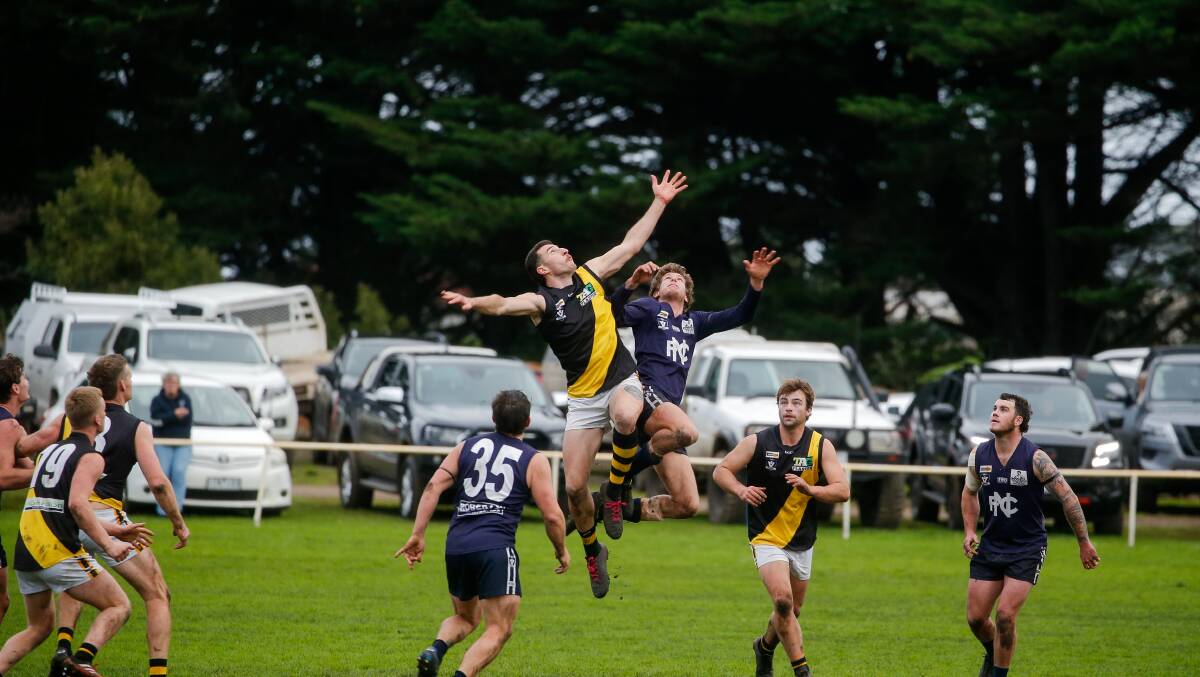 STILL ALIVE: Merrivale's Mikey Boyd and Nirranda's Jarryd Walsh contest for the ball earlier this year. Picture: Anthony Brady 