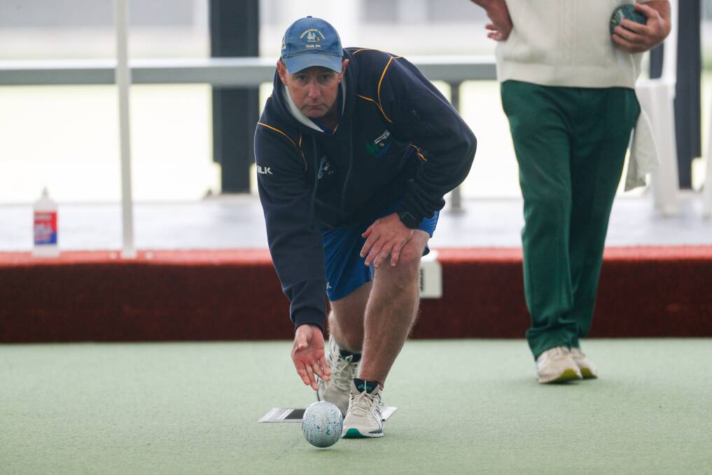 Getting it going: Warrnambool Gold skipper Mark Bowles releases a bowl on the green. 