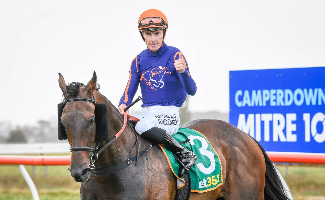 Thumbs up: Patrick Moloney returns to the mounting yard on Declares War after winning the Camperdown Cup on Saturday. Picture: Reg Ryan/Racing Photos