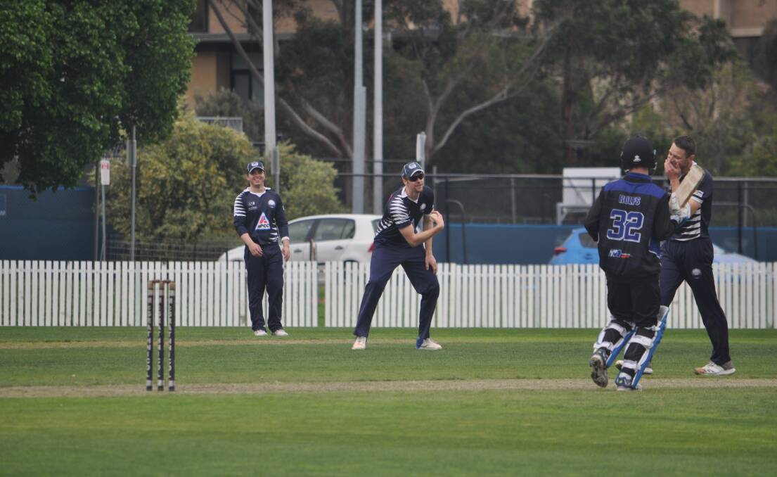 All the action: Bowler Brody Couch walks back to his run up. He was on a hat-trick for Geelong against Melbourne University on Saturday.