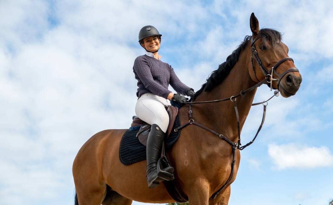 AT HOME: Georgia Hodgetts, 21, and her horse Corinda in their arena at Bushfield. Picture: Chris Doheny