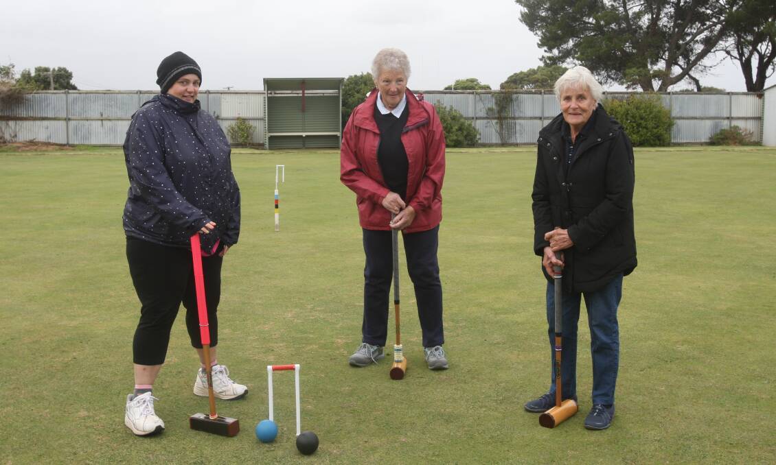 Working on skills: Warrnambool City Croquet Club members Natalie French, Agnes Johnstone and Christina Dickie enjoy a game. French and Dickie are first-year players. Picture: Brian Allen