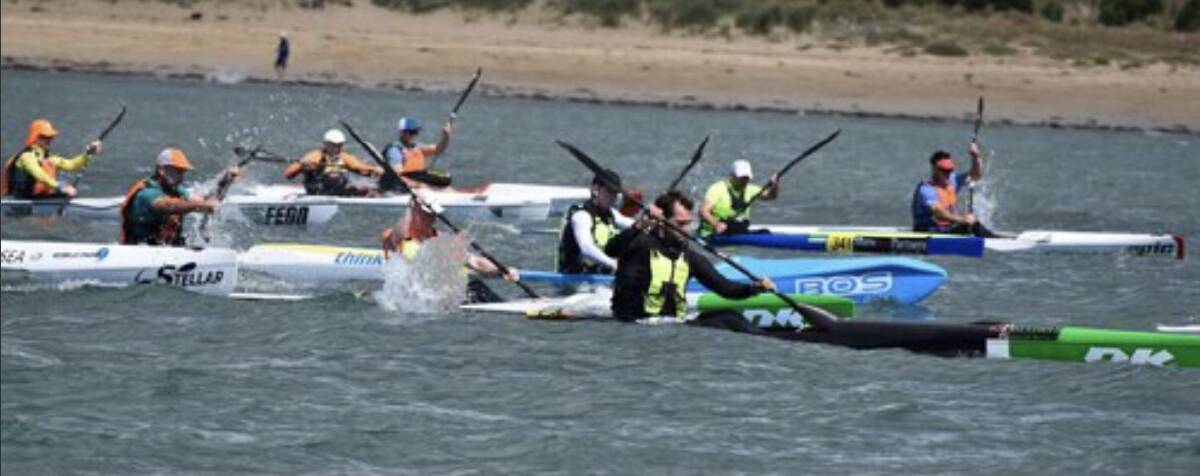 On the water: Competitors make a start in The Impossible ocean ski race which is from Torquay to Barwon Heads.