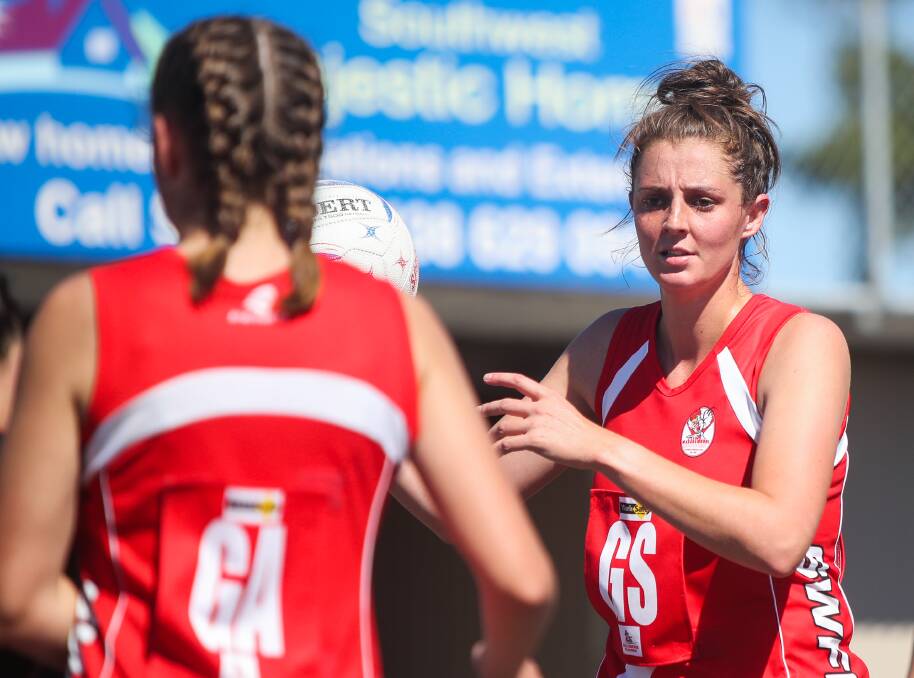 Team: South Warrnambool's Annie Blackburn (with ball) and Olivia Marris have been working well together under the goals this season. Picture: Morgan Hancock