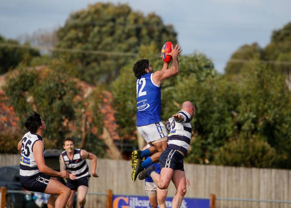 In the air: Russells Creek's Jyran Chatfield flies high during his team's win against Allansford on Saturday. He kicked six goals. Picture: Anthony Brady 