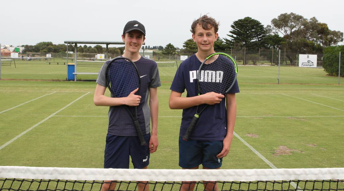 BACK ON COURT: Curtis Finch, 14, and Isaac Brian, 13, played against each other in Warrnambool Lawn Tennis Club junior pennant on Saturday morning. Picture: Brian Allen