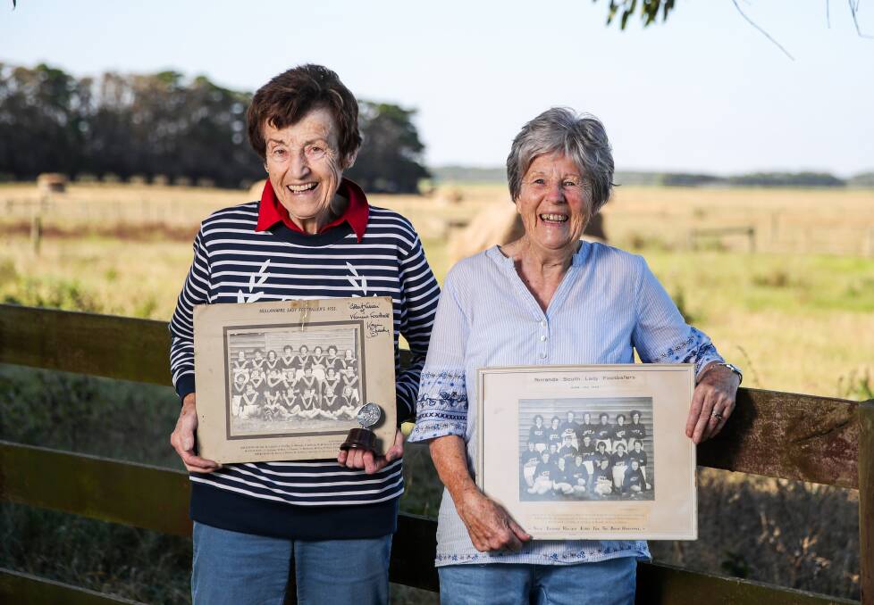 Great memories: Nullawarre residents Judith Poumako and Merle Dalton were part of women's football teams in the 1950s. They are pictured with their team photos. Picture: Morgan Hancock 