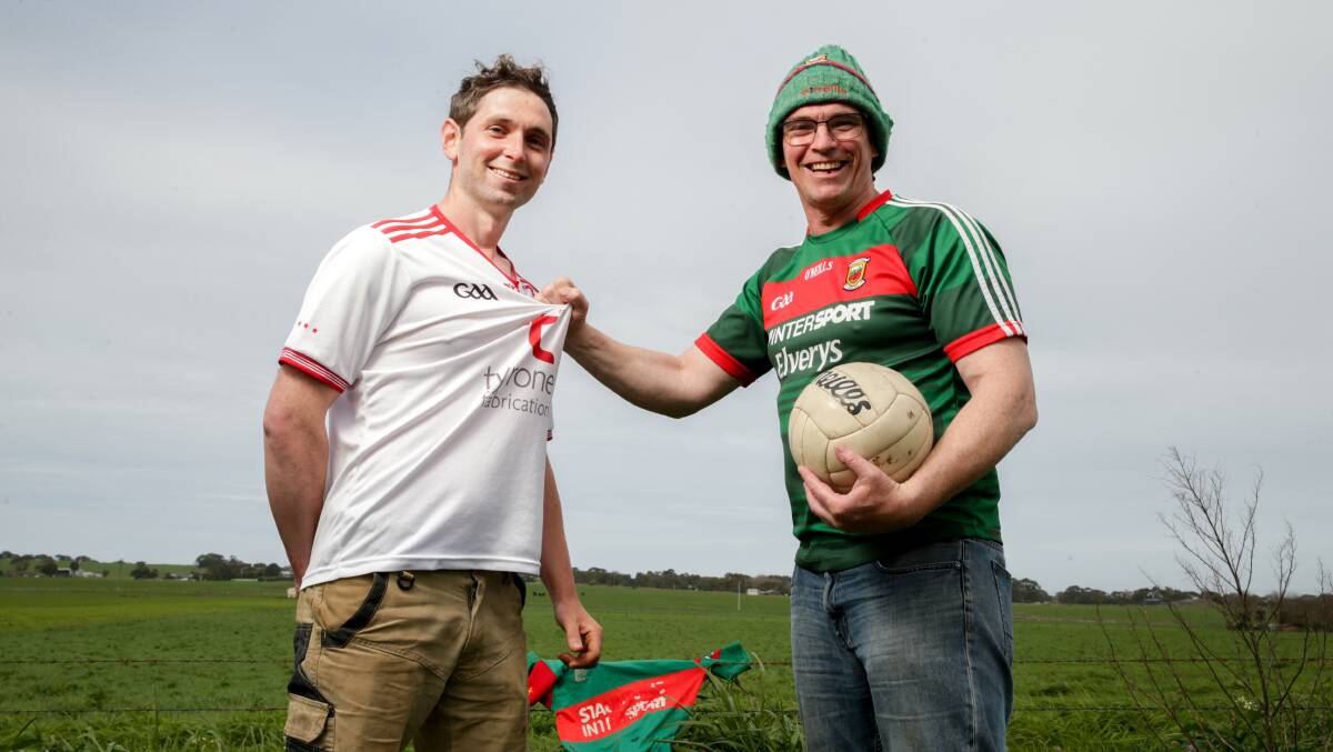 GAME ON: Tyrone supporter James Cassidy and Mayo man Martin Ruane at Koroit ahead of the All-Ireland final. Picture: Chris Doheny