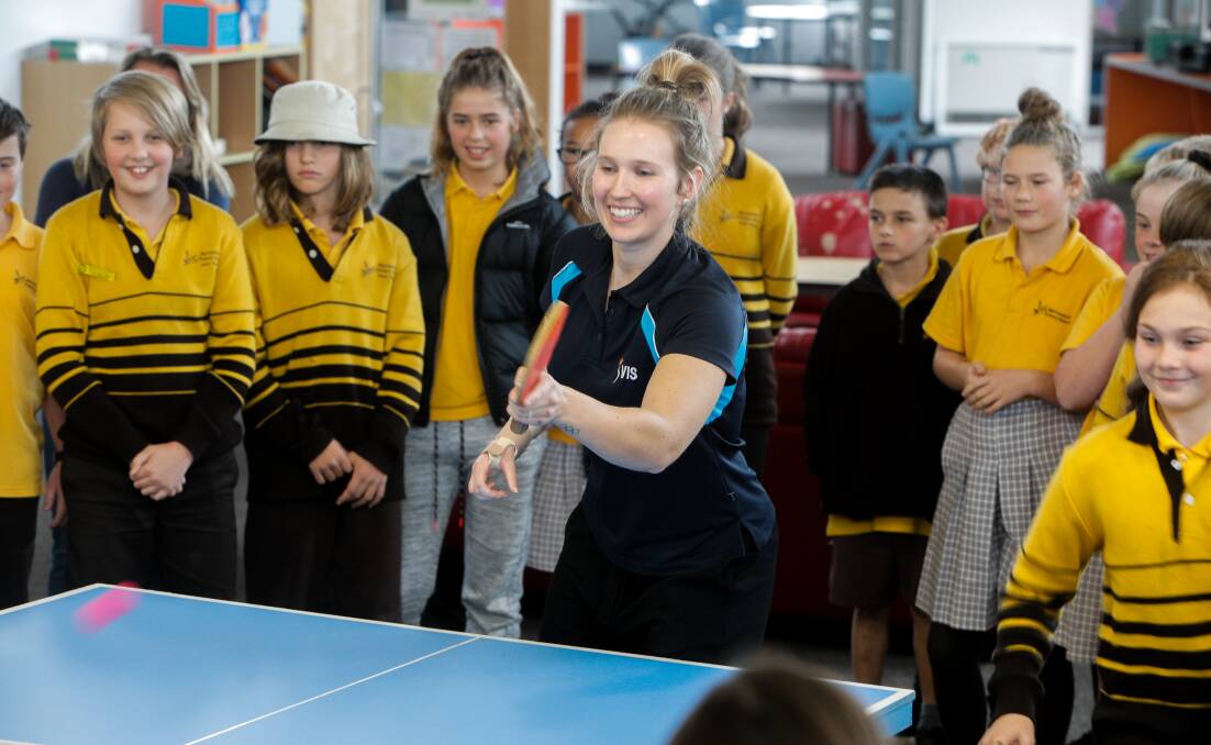 Generous: Olympic table tennis player Melissa Tapper puts on a demonstration for Warrnambool Primary School students in 2017. 