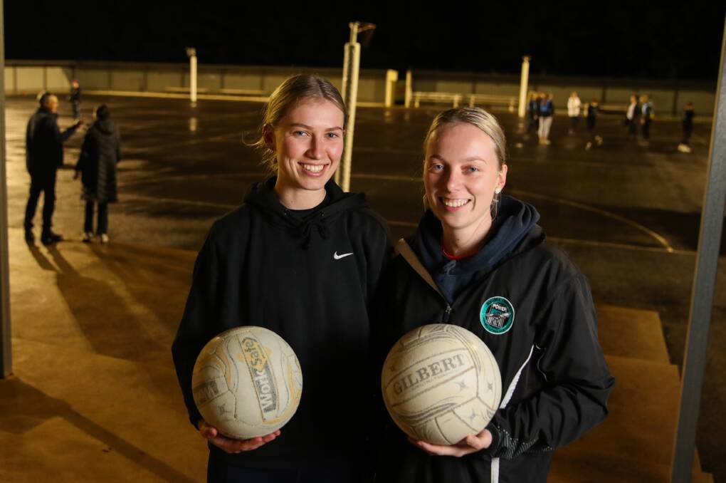 Playing in attack: Tegan, 19, and Kaylee Malady, 21, at Kolora-Noorat training. They play in the goal circle together. Picture: Morgan Hancock 