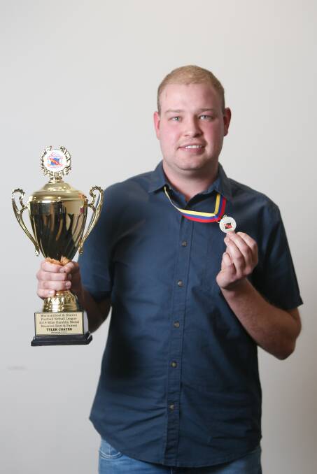 Top gongs: Nirranda's Tyler Coates with his awards. Picture: Mark Witte