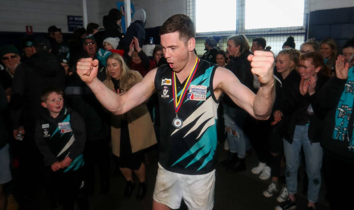A moment to savour: Kolora-Noorat's Nick Bourke celebrates in the rooms after 2019 premiership success. Picture: Morgan Hancock