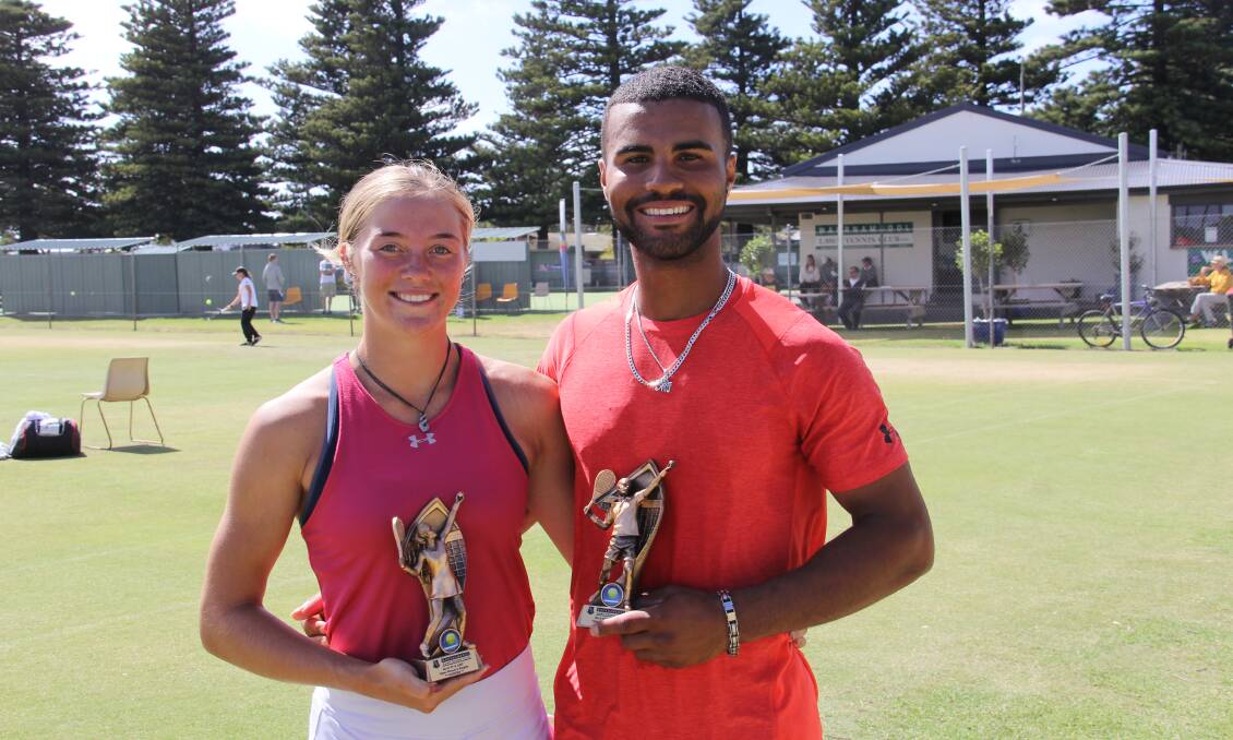 Happy couple: Monique Barry, 17, and boyfriend Omar Fields, 22, took out the women's and men's singles titles at the Warrnambool grasscourt tournament. Picture: Brian Allen