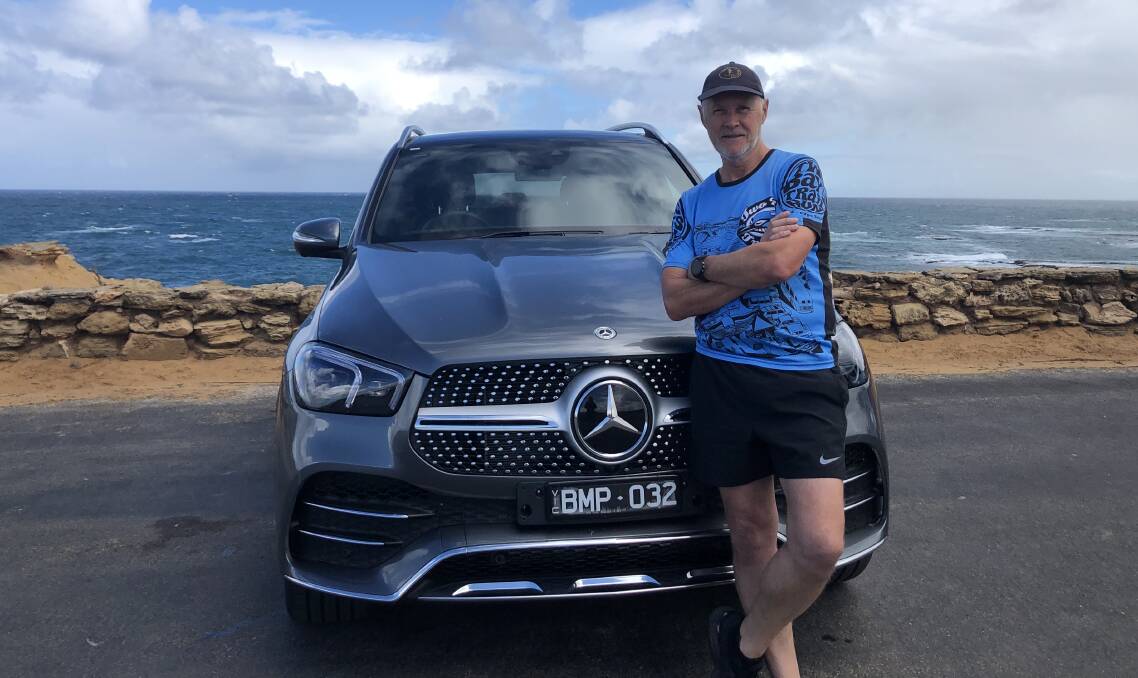 Major prize: Warrnambool Athletics Club committee member Kerry Clapham with a Callaghan Motors' Mercedes-Benz at Thunder Point. Picture: Brian Allen