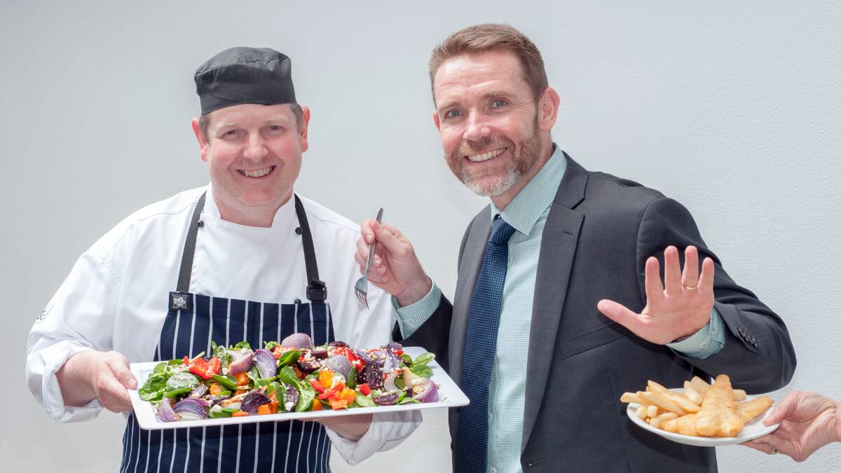 Going green: WDHS Group Manager Support Services, John Hedley (left) and Chief Executive Rohan Fitzgerald demonstrate the change of menu at WDHS.