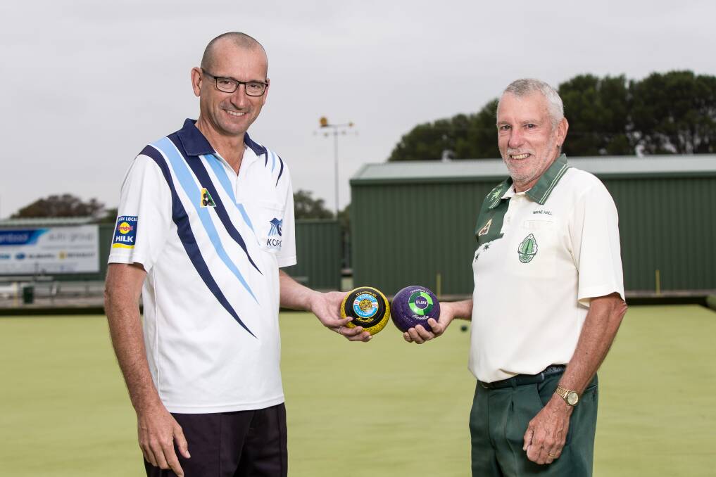 Clash of legends: Koroit Blue's Peter Daly and City Memorial Red's Wayne Hall ahead of the bowls grand final. Picture: Christine Ansorge