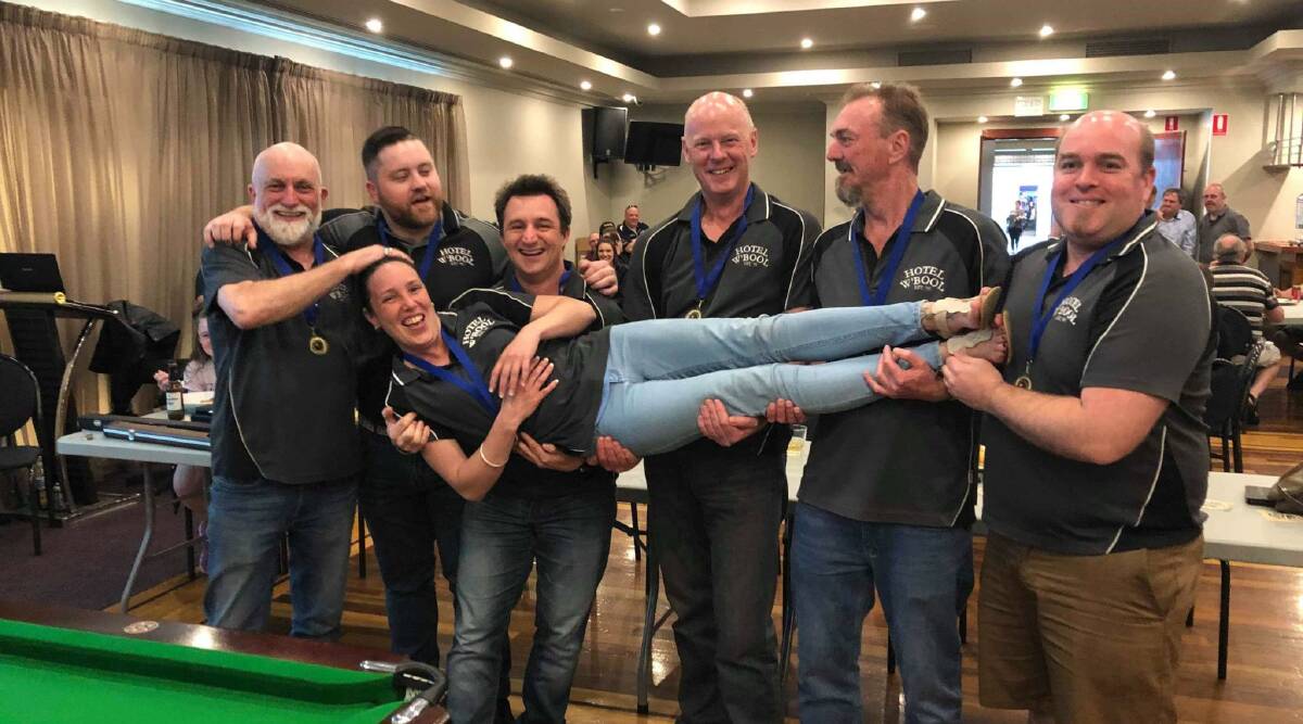 Good fun: Warrnambool C's were division two premiers. Jed Mast, Karl O'Brien, Jarryd Mast, Peter Honan, Anthony Johnstone and Dale Hyder lift up Krystal Brown.
