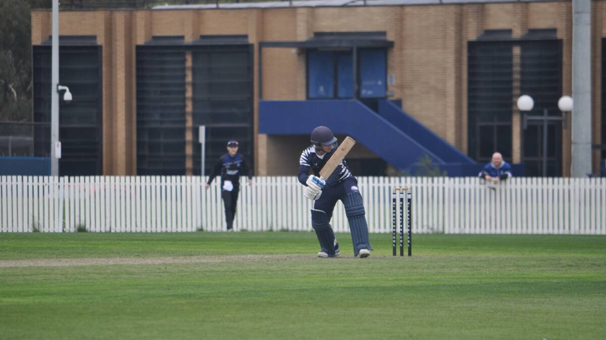 Good shot: Woodford product Tommy Jackson hits one away for Geelong against Melbourne University.
