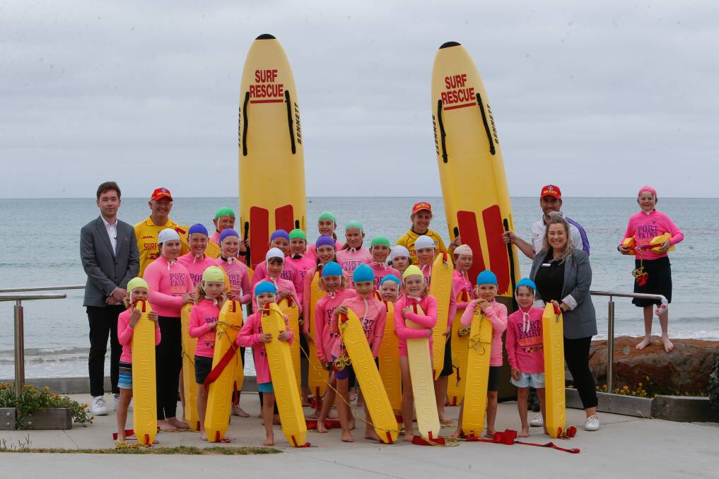 STARTING SOON: Port Fairy Surf Lifesaving Club's nippers. Community Bank Port Fairy and District's Hollie Ciurleo and Tom Flaherty, nipper's coordinator Nicole Dwyer, club president Adam McCosh and club captain Mick McGoldrick are also in the photo. Picture: Emma Stapleton