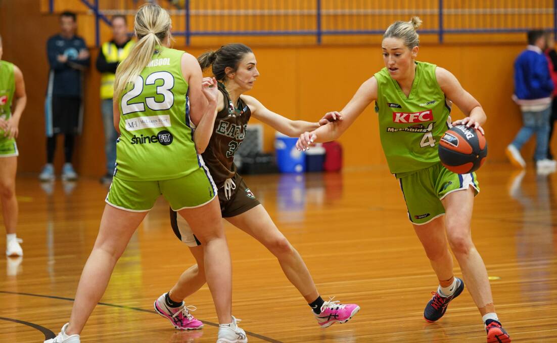Making a move: Warrnambool Mermaids' Amy Wormald in action at The Arc on Saturday night. Picture: Larry Lawson 