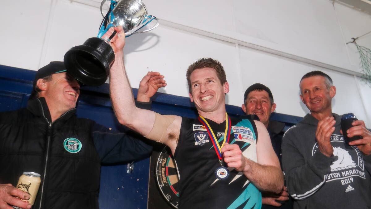 WONDERFUL STINT: Ben Walsh thanks Kolora-Noorat's suporters after the 2019 premiership win. He has stepped down as Power coach. Picture: Morgan Hancock 