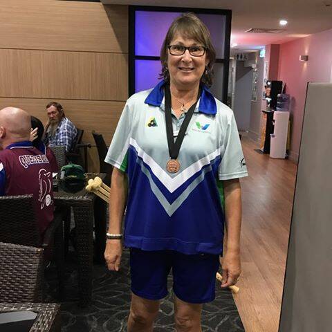 Medal winner: Cavendish's Alison East with the bronze medal she won in the B7/8 women's singles at the Multi-Disability Lawn Bowls National Championships in Mackay.