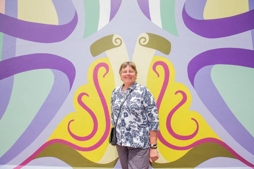 Art: Warrnambool street art tour guide Claire Norman in front of the mural at the Warrnambool Art Gallery. Picture: Christine Ansorge