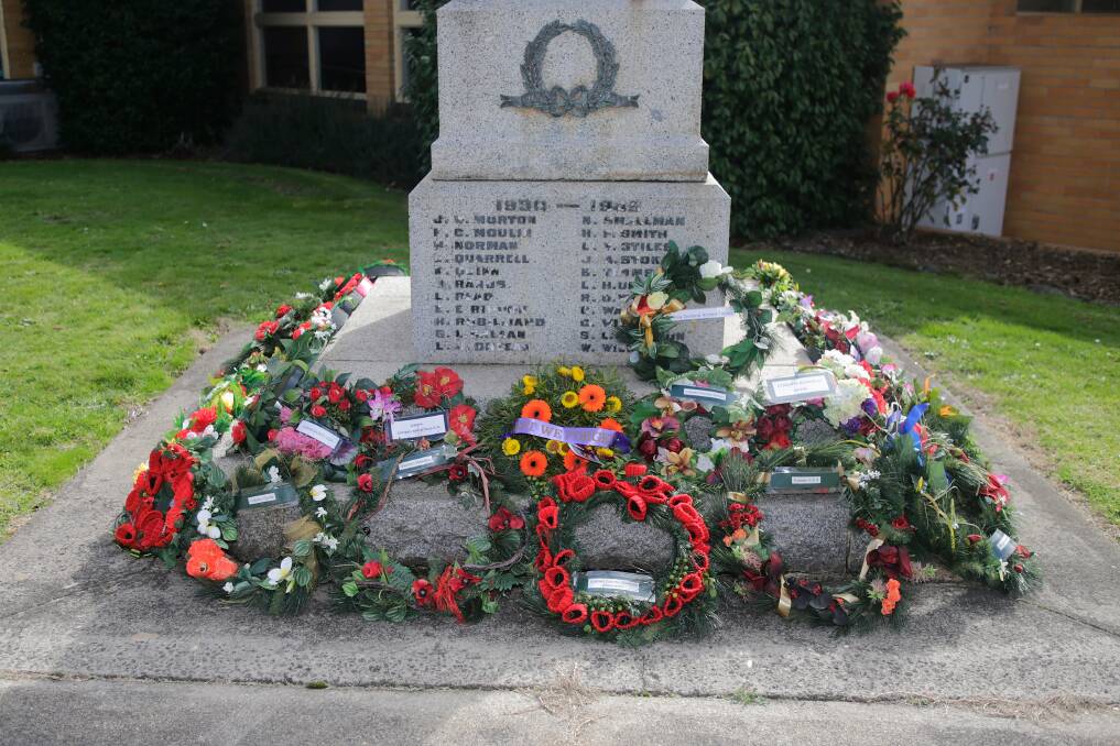 REFLECTION: Wreaths laid at the Cobden war memorial. Picture: Mark Witte