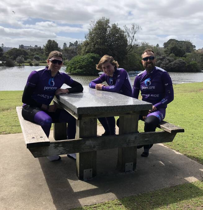 STRONG TEAM: Adam Beaumont (centre) with Matt Greer (left) and Adam Brown take a break at Lake Pertobe on their ride from Port Fairy to Port Campbell.