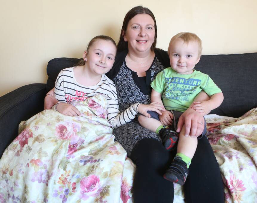 ON THE MEND: Zara Roney, 9, with mum Naomi Harvey and brother Zac Roney, 19 months. Zara had chronic tonsillitis. Picture: Amy Paton