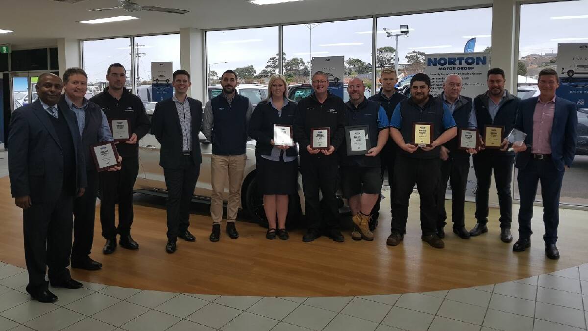 BIG WIN: Staff from Warrnambool's Norton Ford received their awards from Ford management. Picture: Supplied